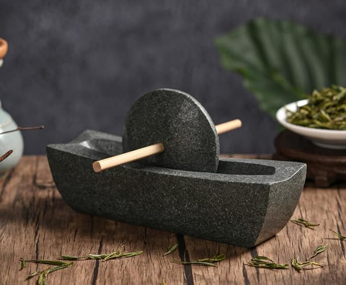 Bluestone roller, tea grinding in Song Dynasty, small stone mortar, roller, matcha tea powder production, tea cake grinding, coffee bean grinding.
