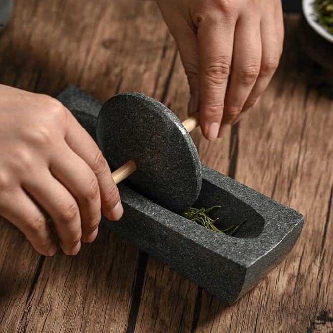 Bluestone roller, tea grinding in Song Dynasty, small stone mortar, roller, matcha tea powder production, tea cake grinding, coffee bean grinding.